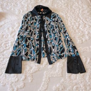 Bebe sheer print white blue and black Satin collar shirt.